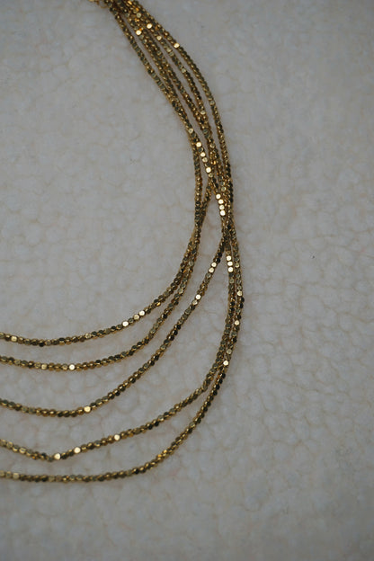 Collier doré brillant cinq rangs