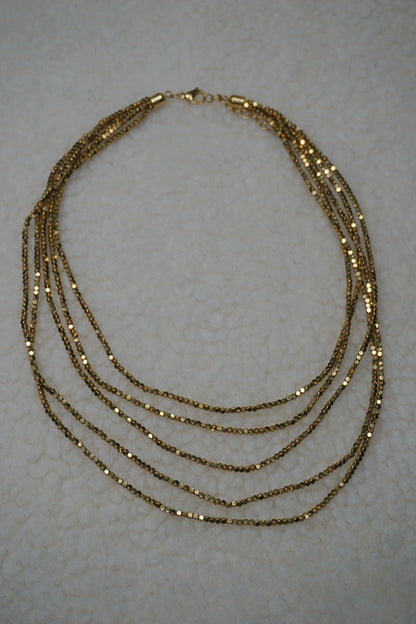 Collier doré brillant cinq rangs