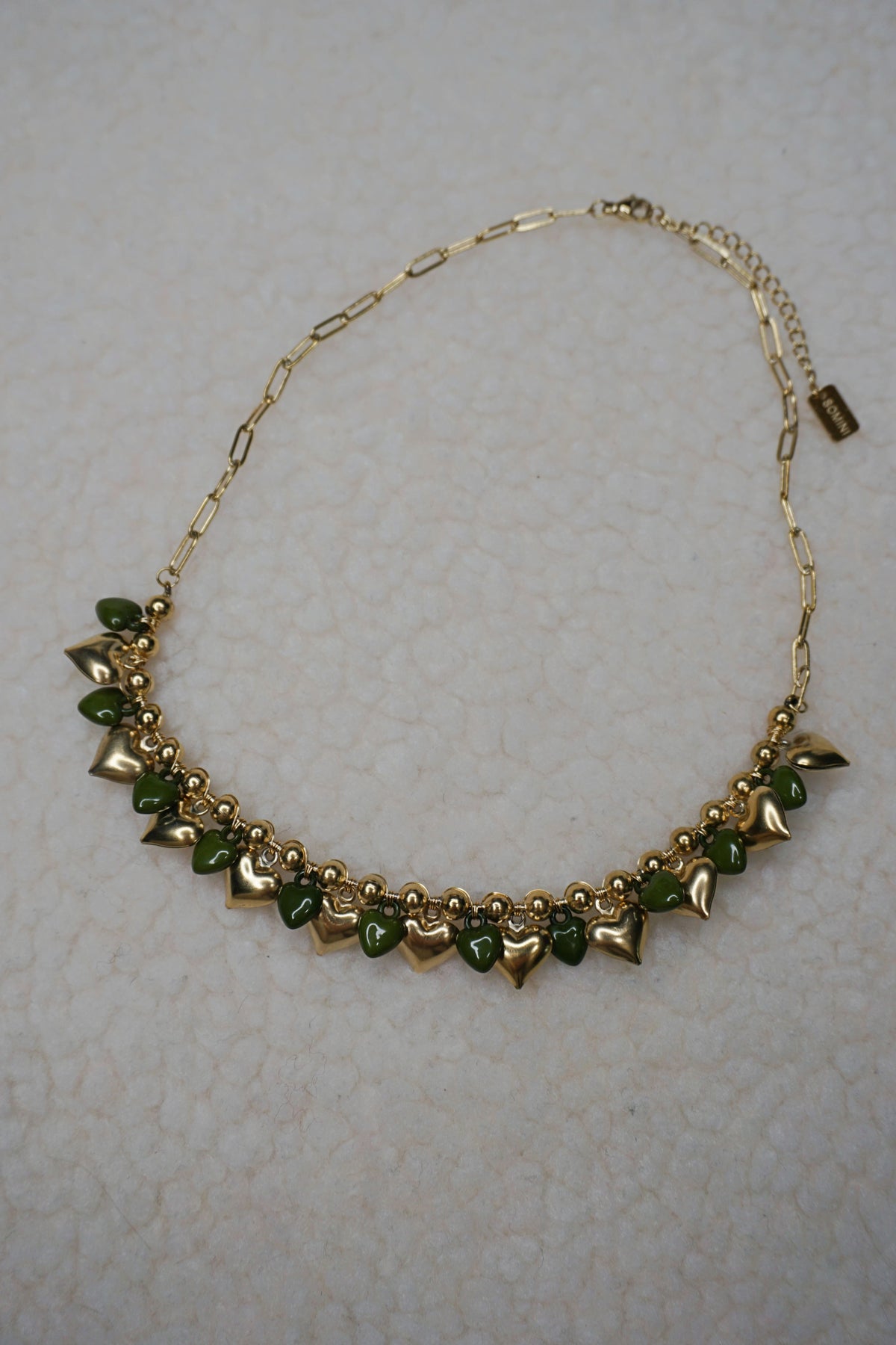 Collier doré cœurs verts