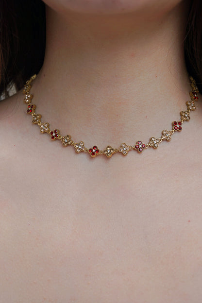 Collier doré et trèfles champagne