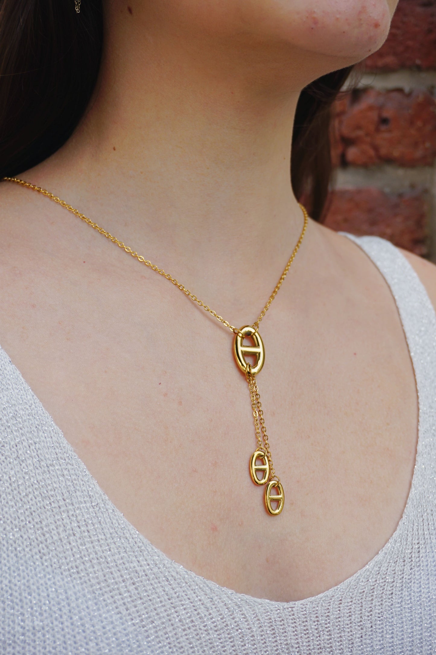 Collier doré pendant et boucles