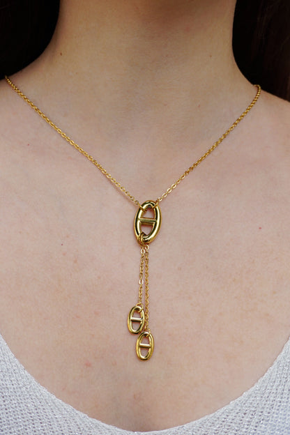 Collier doré pendant et boucles