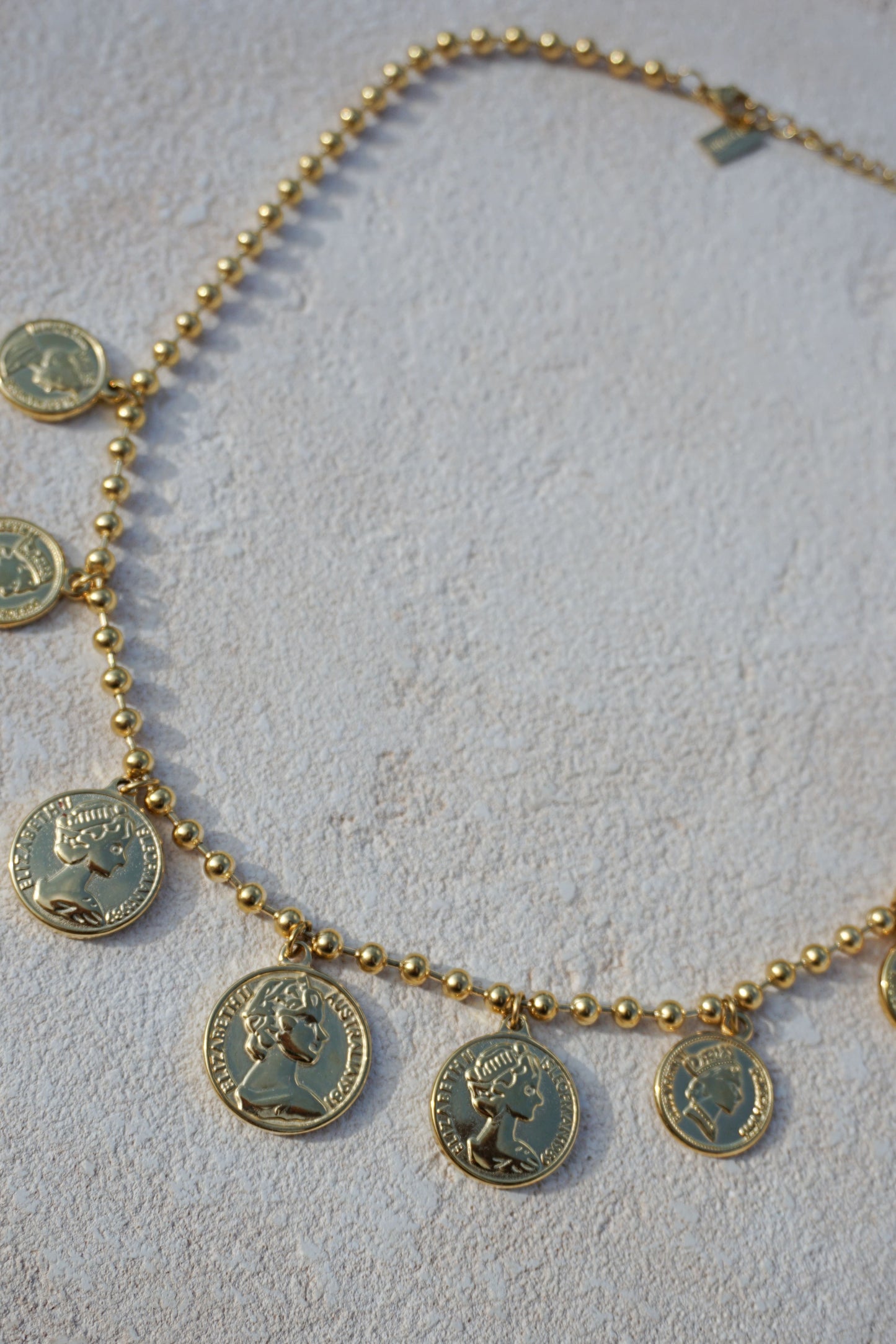 Collier doré pièces de monnaie