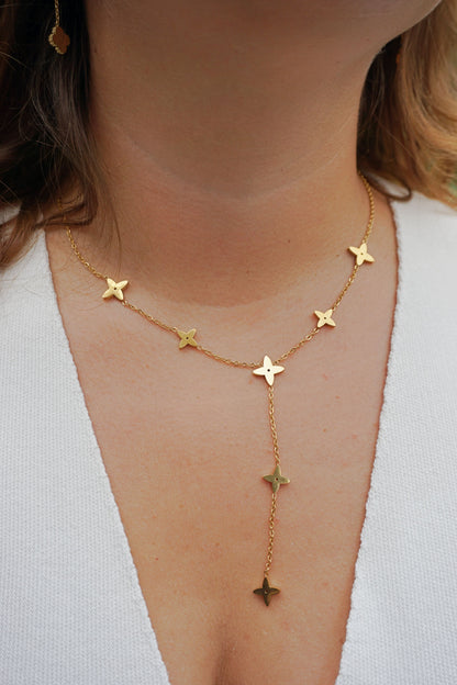 Collier doré tombant étoiles
