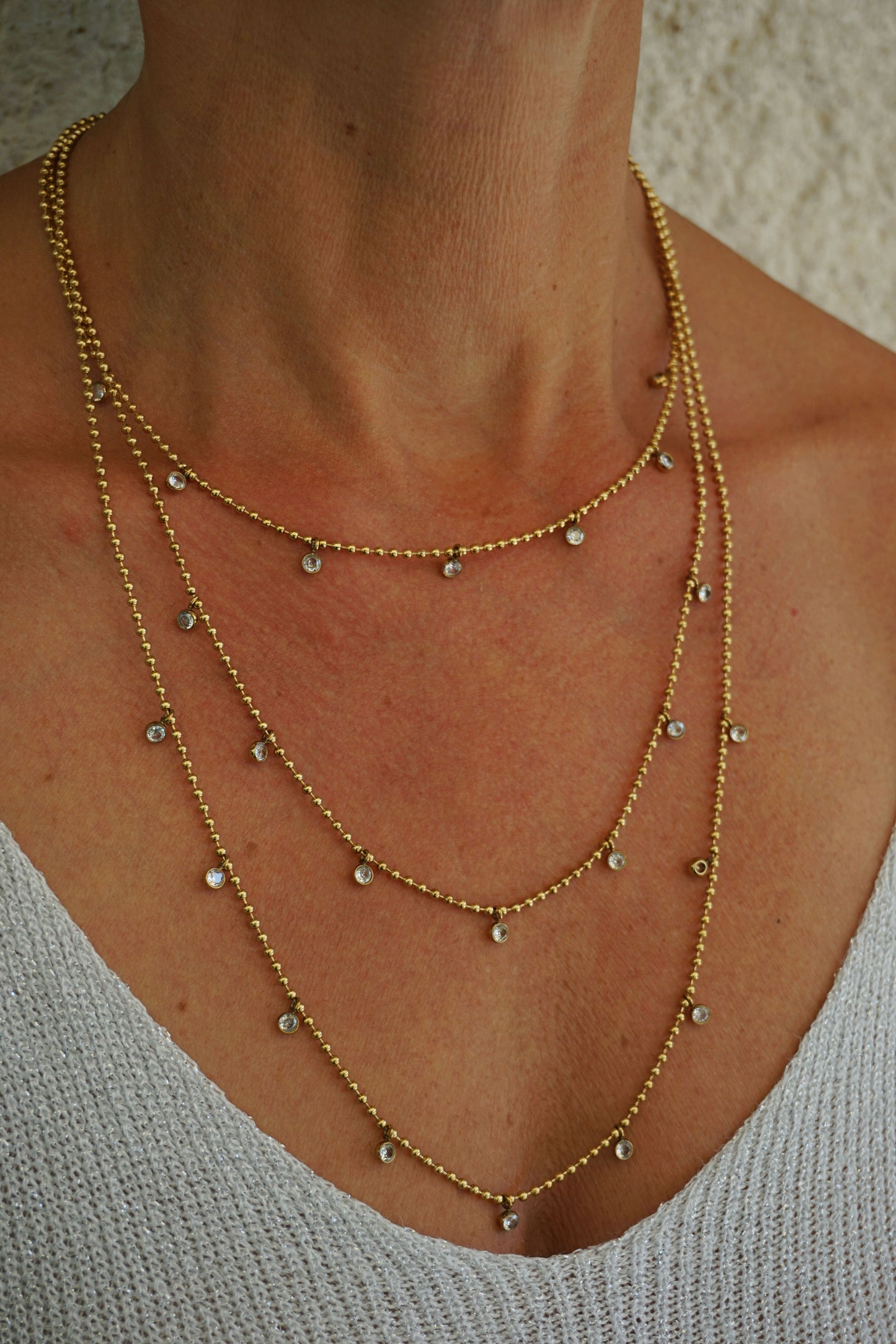 Collier doré triple et strass