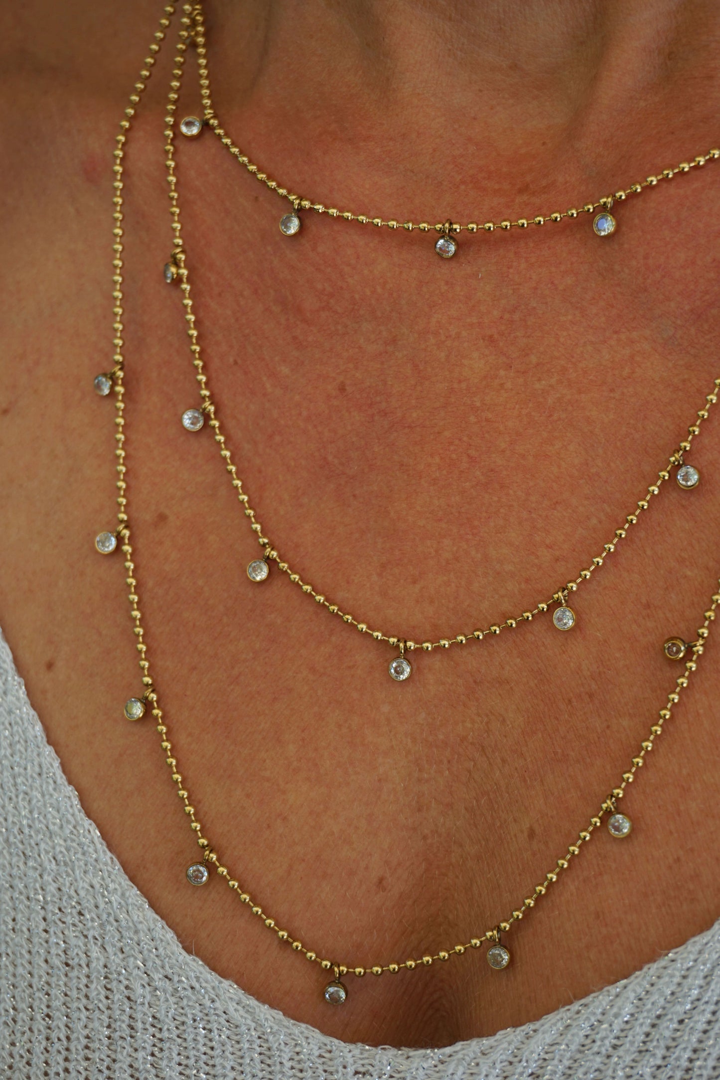 Collier doré triple et strass