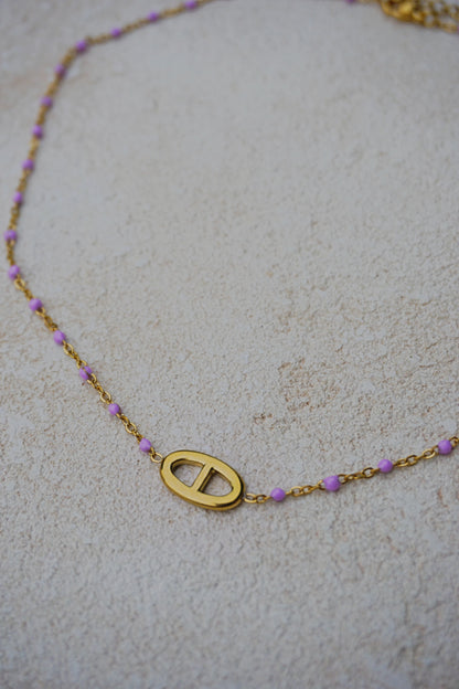 Collier fin doré boucle et petites perles lilas