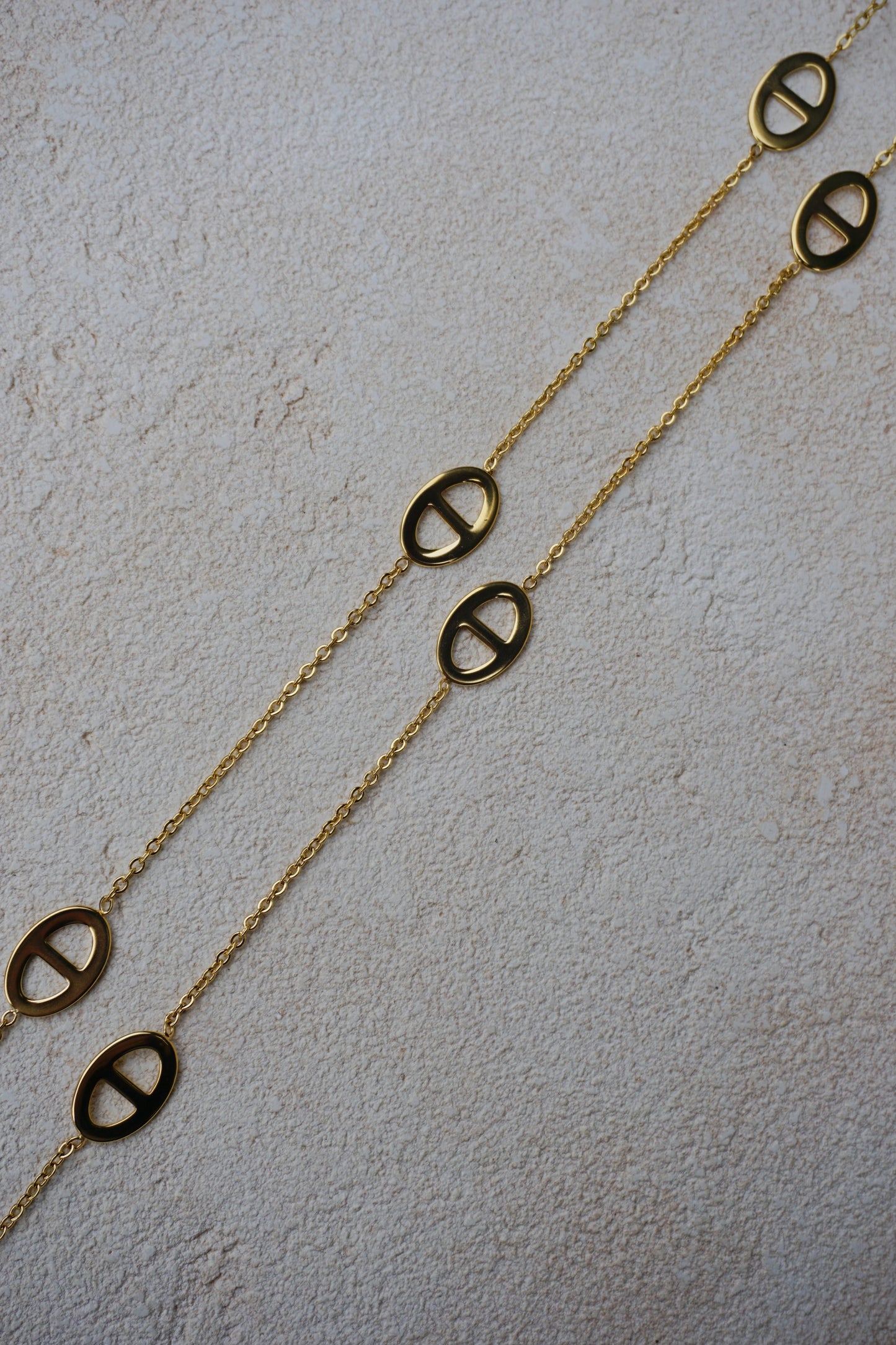 Collier doré long sautoir