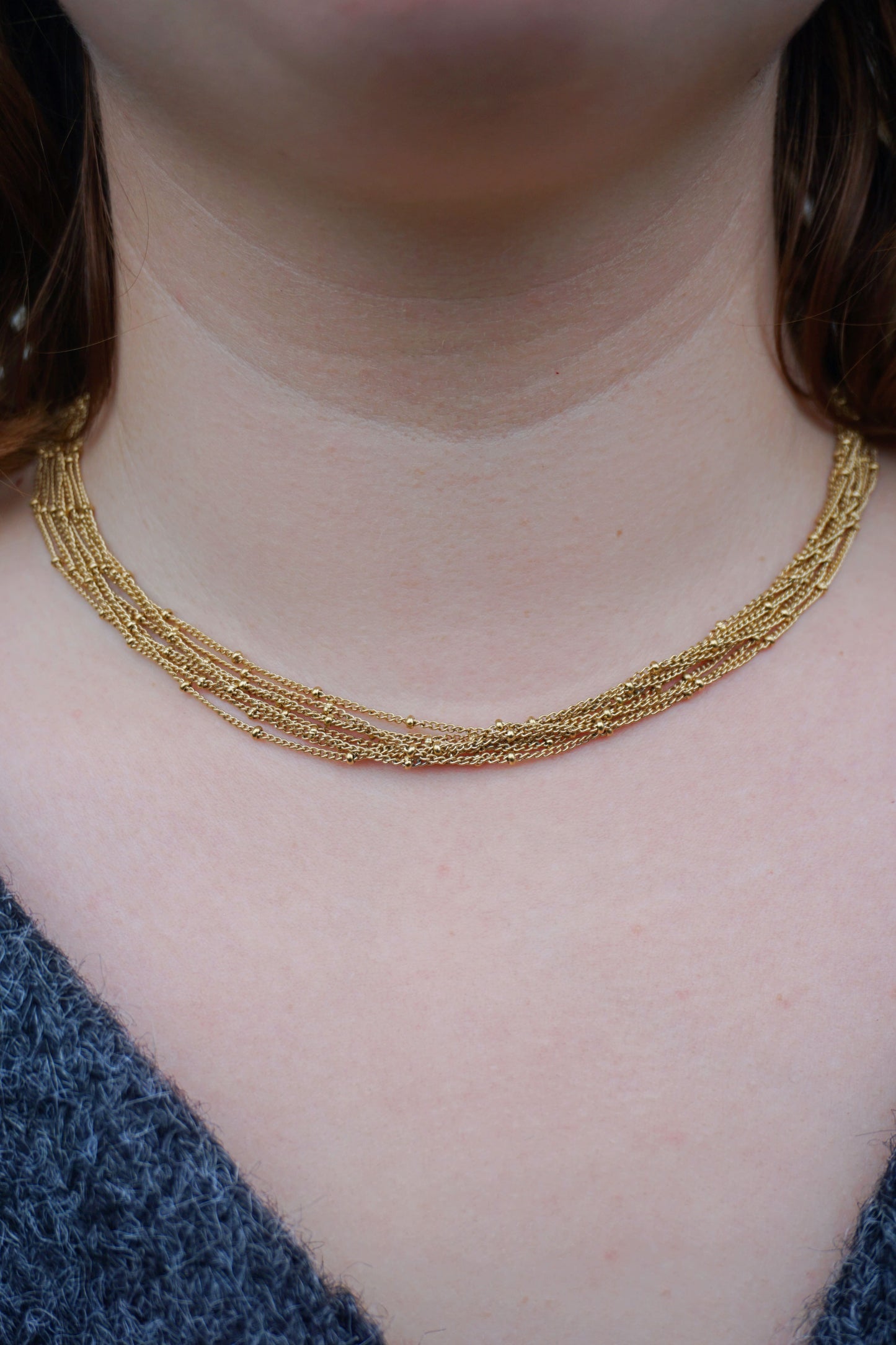 Collier doré multi-chaînes fines