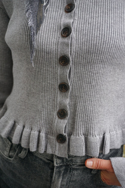 Gilet gris volanté