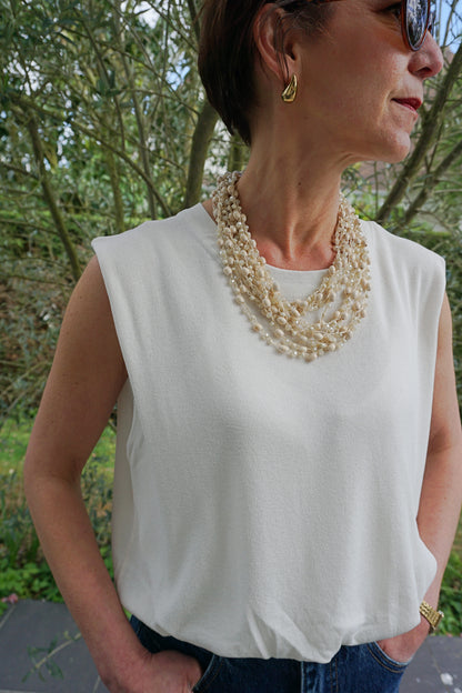 Gros collier perles crèmes multi rangs
