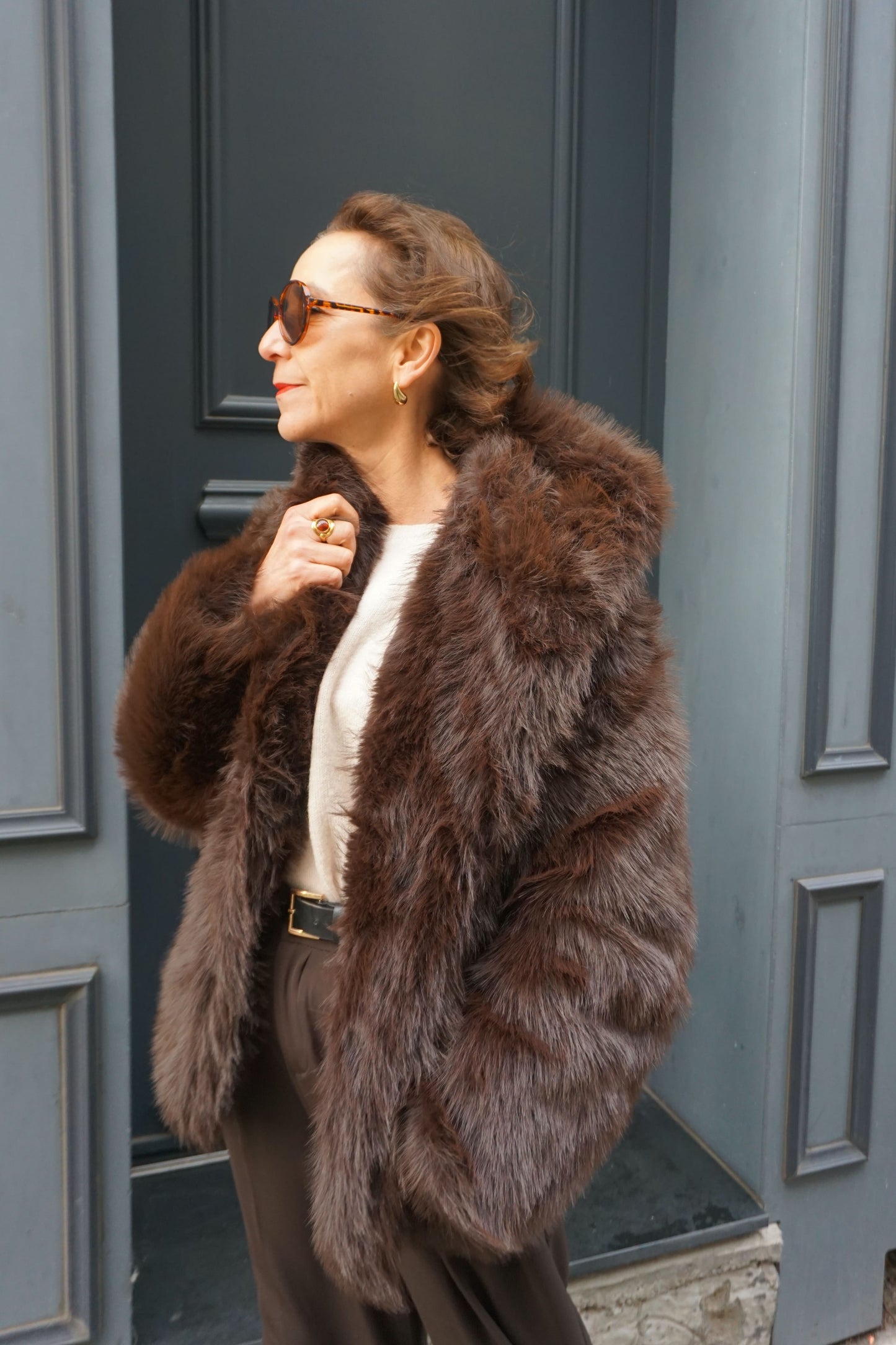 Manteau fausse fourrure marron capuche