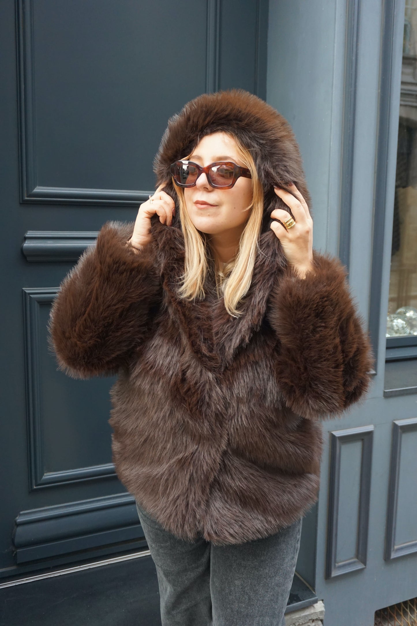Manteau fausse fourrure marron capuche