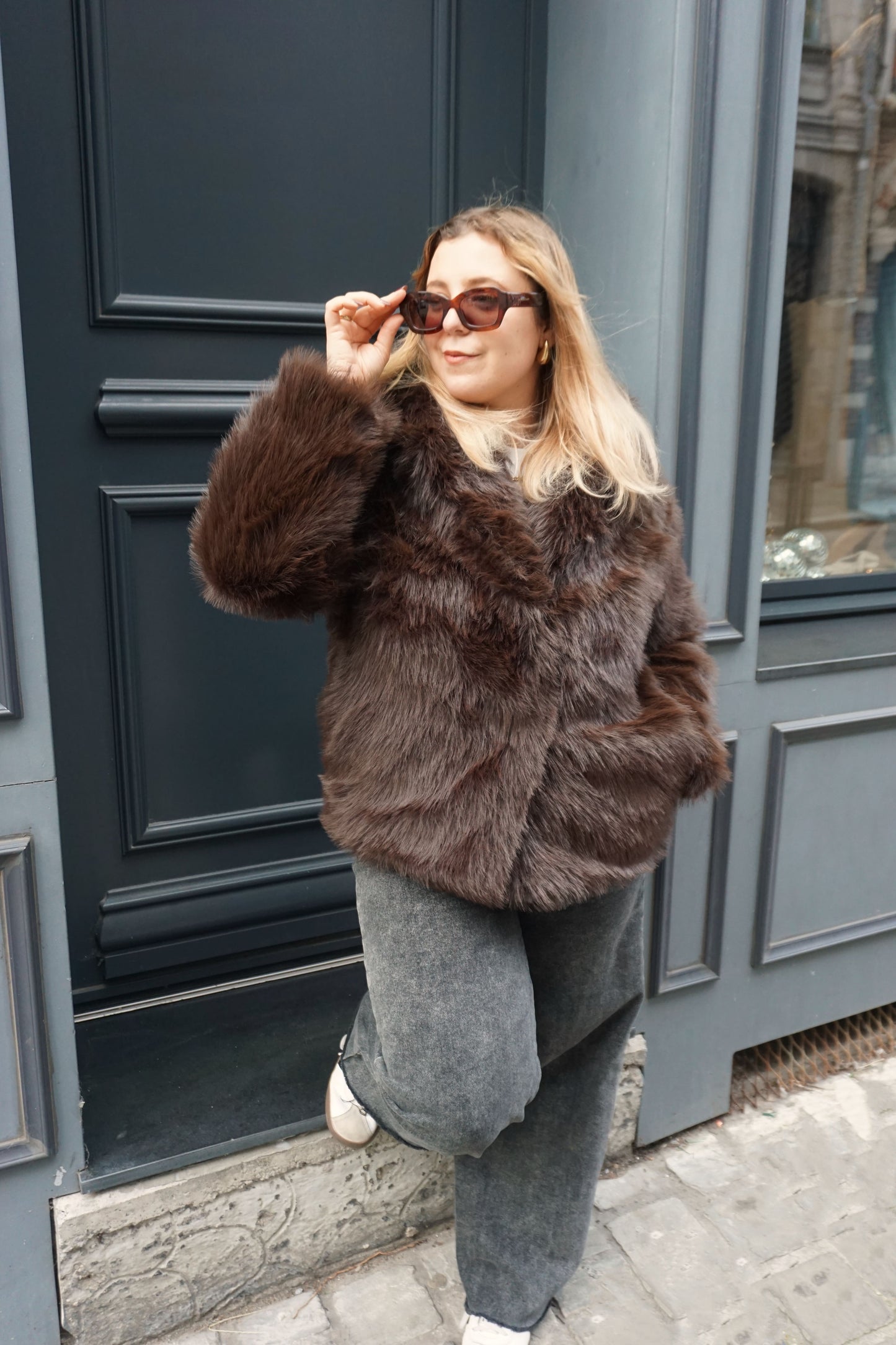 Manteau fausse fourrure marron capuche