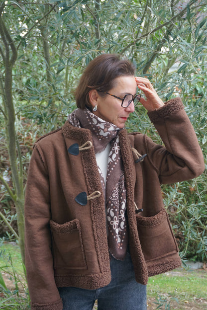 Manteau marron chocolat et attaches
