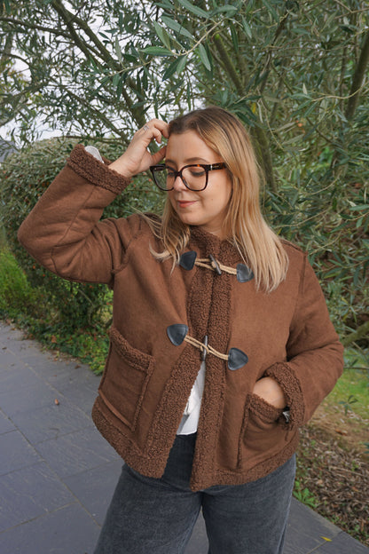 Manteau marron chocolat et attaches
