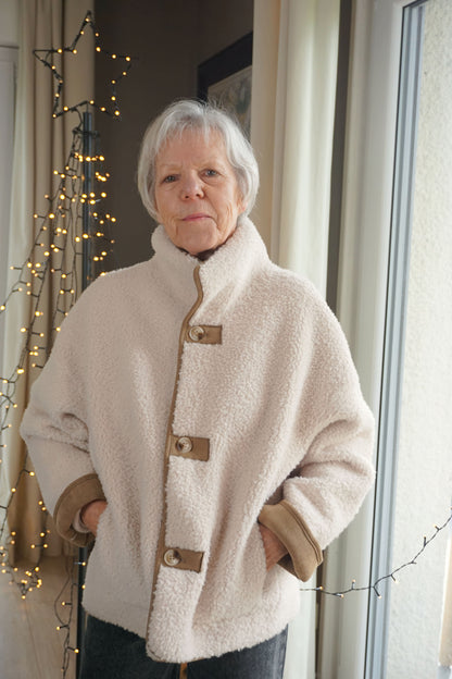 Manteau réversible effet daim et teddy
