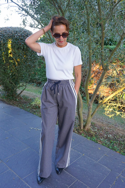 Pantalon style jogging à carreaux et bandes