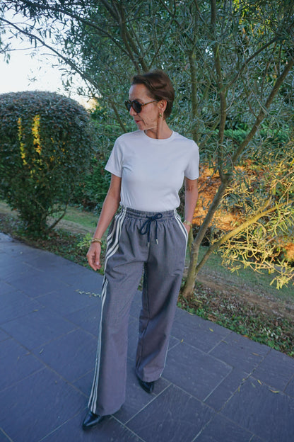 Pantalon style jogging à carreaux et bandes