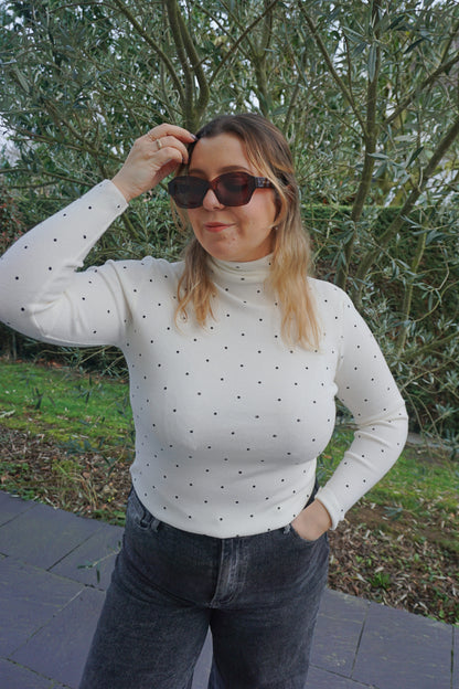Pull col roulé crème pois noirs