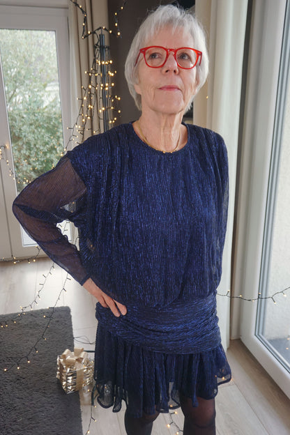 Robe drapée bleue à liseré paillettes