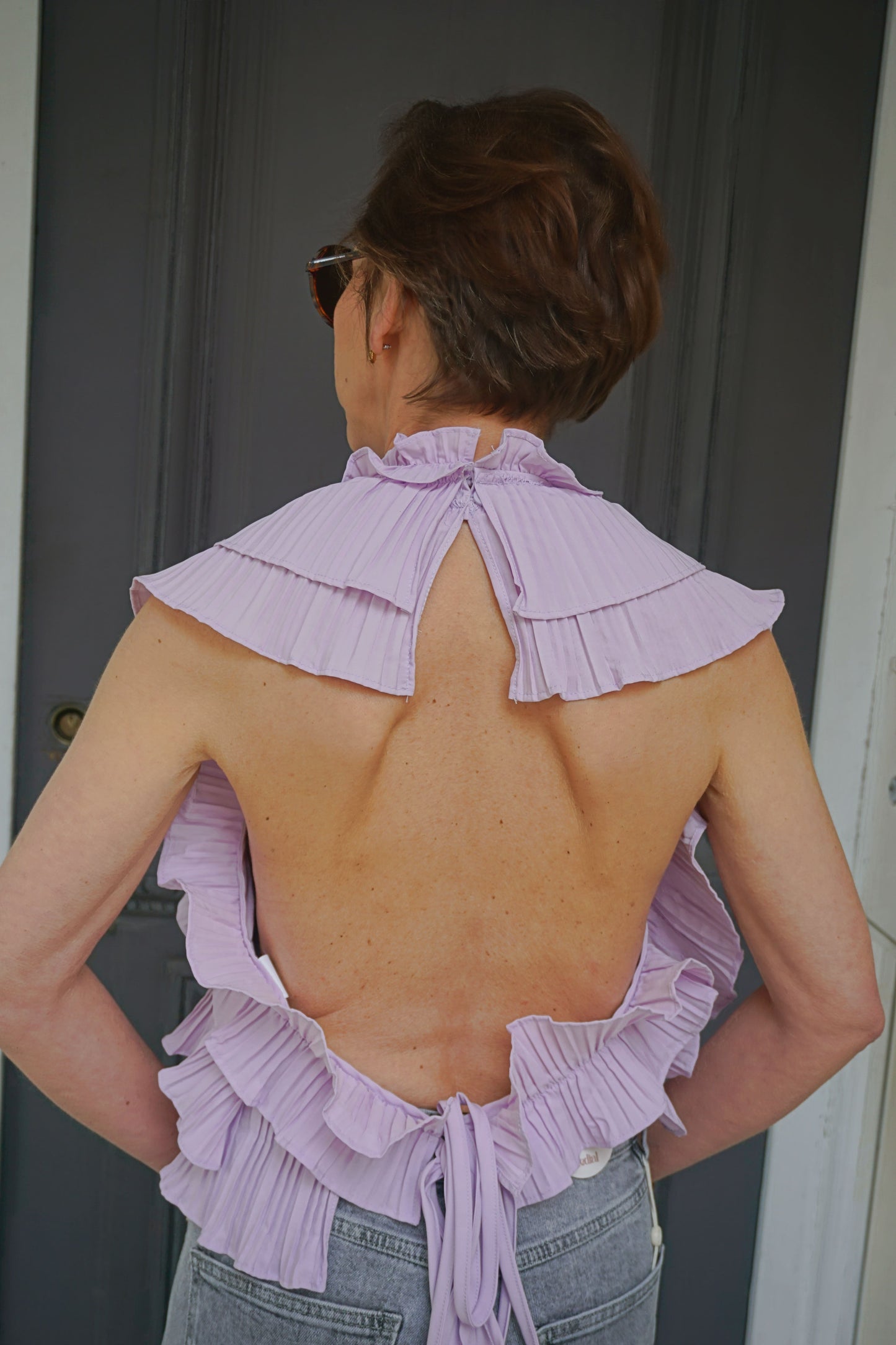 Top lilas à volants dos nu