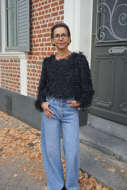 Top noir effet plumes et paillettes
