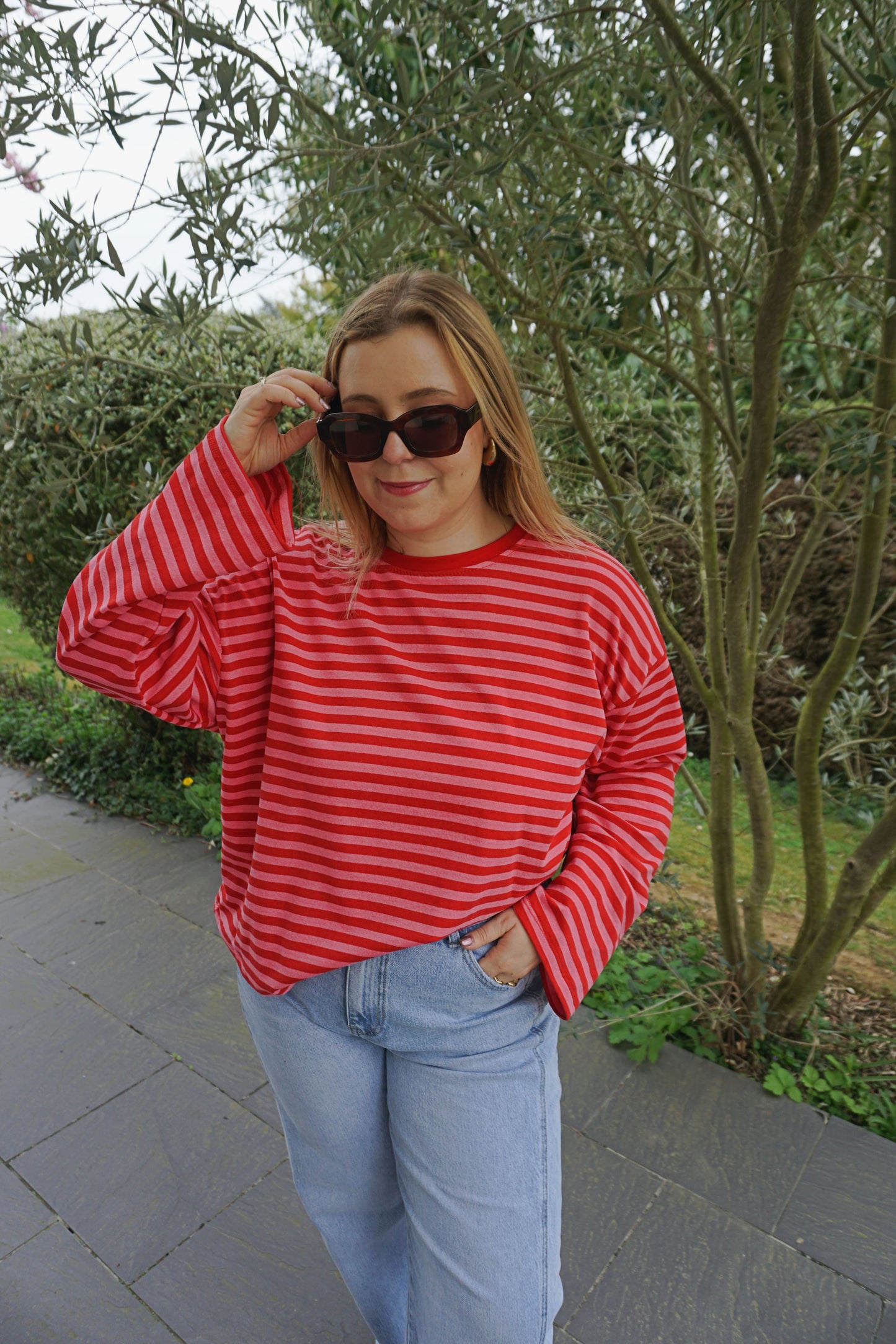 Top rayé rouge rose