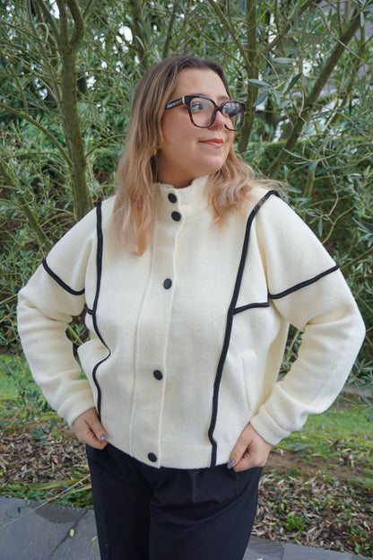 Veste col montant crème coutures noires