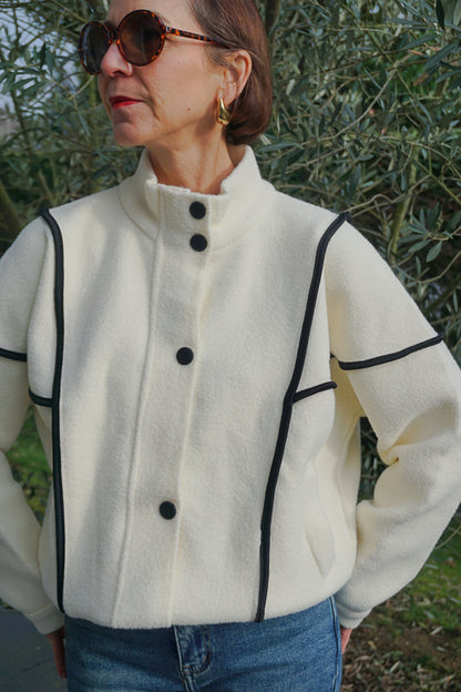 Veste col montant crème coutures noires