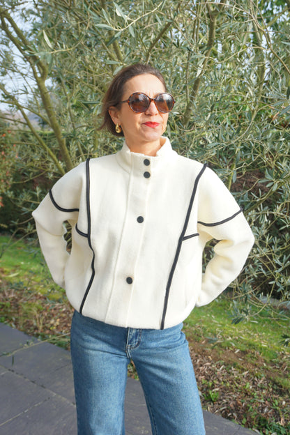 Veste col montant crème coutures noires