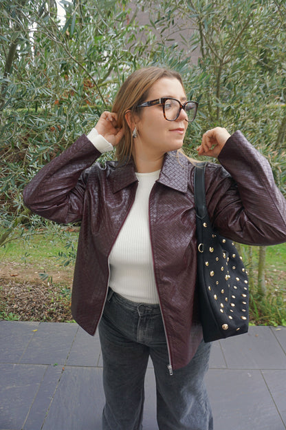 Veste en similicuir tressé aubergine