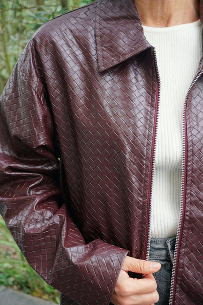 Veste en similicuir tressé aubergine