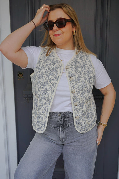 Veste matelassée boléro bleue à fleurs