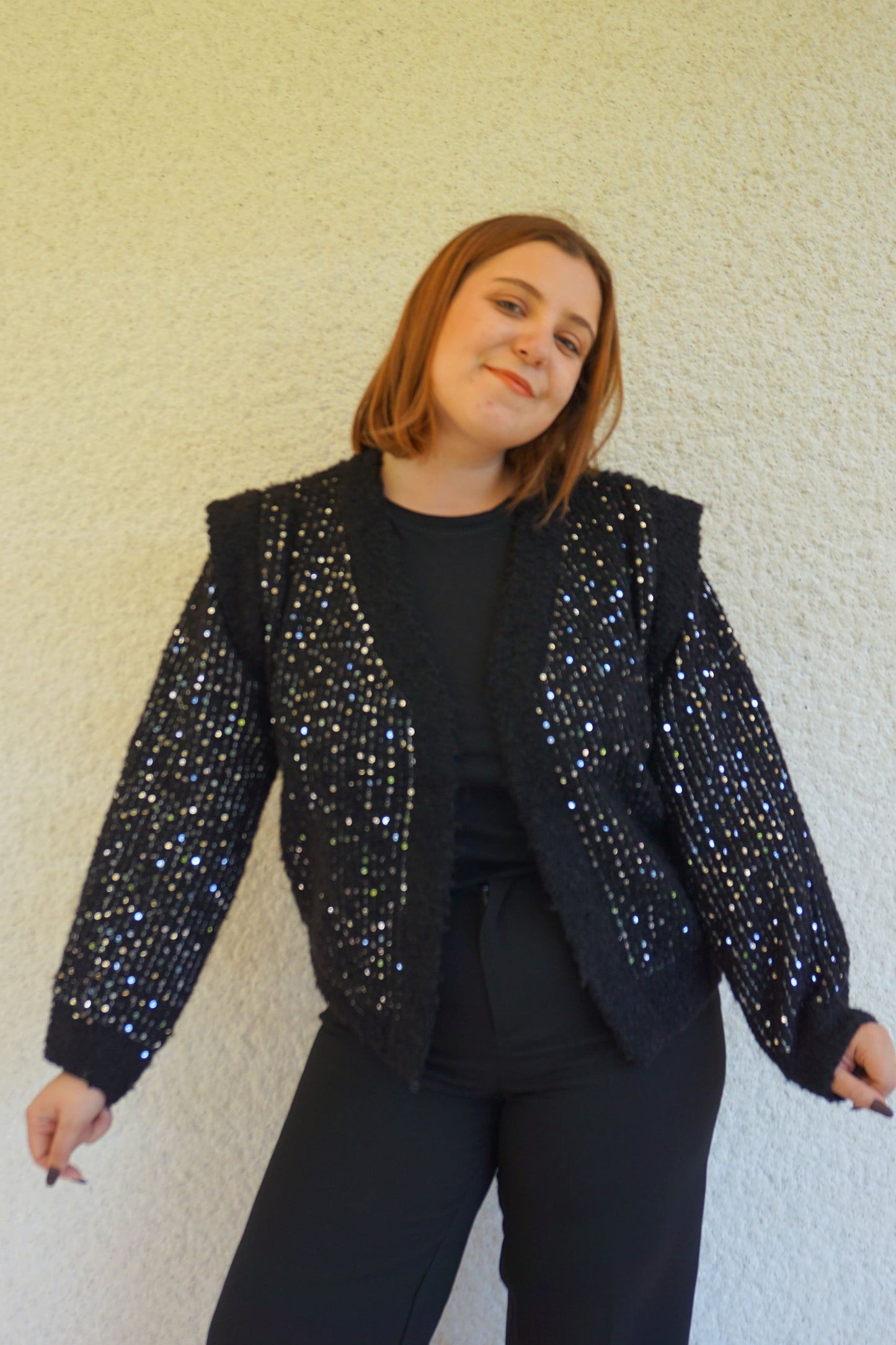 Veste noire à paillettes