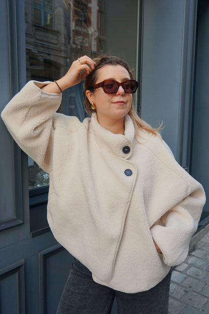 Manteau oversize moumoute blanche